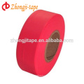 bright red flagging tape